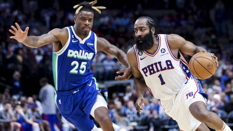 Mar 2, 2023; Dallas, Texas, USA;  Philadelphia 76ers guard James Harden (1) drives to the basket as Dallas Mavericks forward Reggie Bullock (25) defends during the second half at American Airlines Center. Mandatory Credit: Kevin Jairaj-USA TODAY Sports