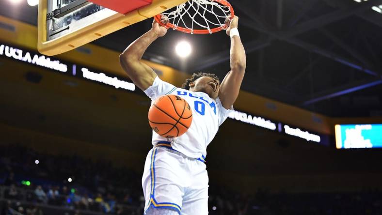 Mar 2, 2023; Los Angeles, California, USA; UCLA Bruins guard Jaylen Clark (0) dunks for the basket against the Arizona State Sun Devils during the second half at Pauley Pavilion. Mandatory Credit: Gary A. Vasquez-USA TODAY Sports