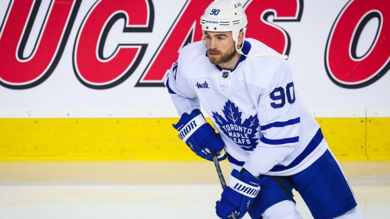 Mar 2, 2023; Calgary, Alberta, CAN; Toronto Maple Leafs center Ryan O'Reilly (90) skates during the warmup period against the Calgary Flames at Scotiabank Saddledome. Mandatory Credit: Sergei Belski-USA TODAY Sports