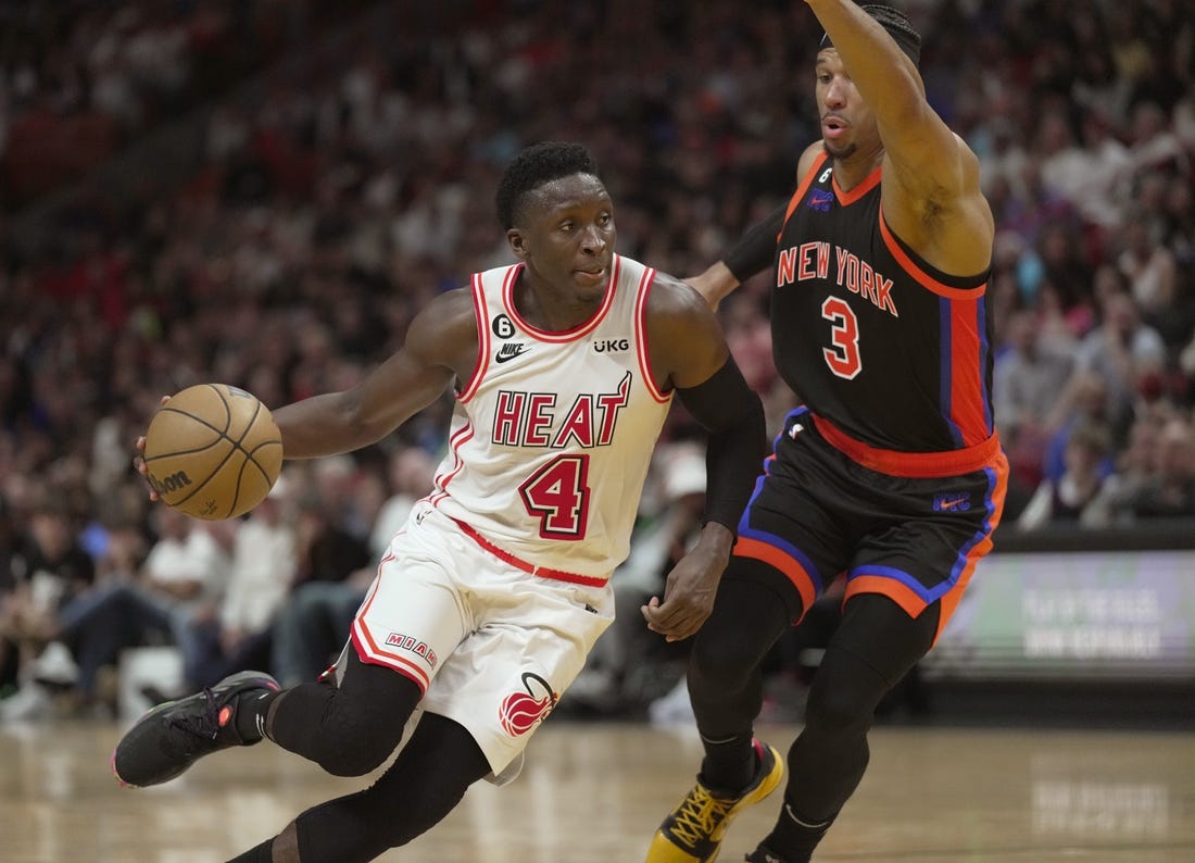 Mar 3, 2023; Miami, Florida, USA;  Miami Heat guard Victor Oladipo (4) drives to the basket past New York Knicks guard Josh Hart (3) during the second half at Miami-Dade Arena. Mandatory Credit: Jim Rassol-USA TODAY Sports