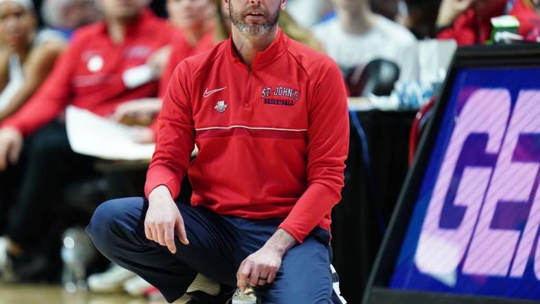 Mar 4, 2023; Uncasville, CT, USA; St. John's Red Storm head coach Joe Tartamella watches from the sideline as they take on the Marquette Golden Eagles at Mohegan Sun Arena. Mandatory Credit: David Butler II-USA TODAY Sports