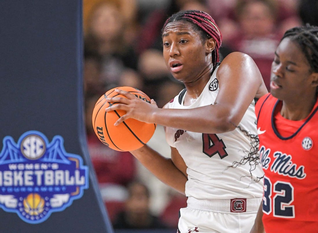 Mar 4, 2023; Greenville, SC, USA; South Carolina forward Aliyah Boston (4) rebounds the ball against Mississippi forward Madison Scott (24) during the fourth quarter at Bon Secours Wellness Arena. Mandatory Credit: Ken Ruinard-USA TODAY Sports