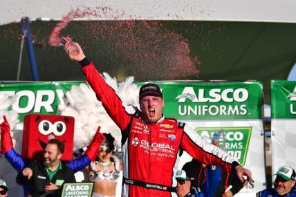 Mar 4, 2023; Las Vegas, Nevada, USA; NASCAR Xfinity Series driver Austin Hill (21) celebrates his victory of the Xfinity Series Alsco Uniforms 300 at Las Vegas Motor Speedway. Mandatory Credit: Gary A. Vasquez-USA TODAY Sports