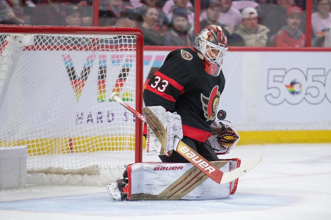 Mar 4, 2023; Ottawa, Ontario, CAN: Ottawa Senators goalie Cam Talbot (33) makes a save in the second period against the Columbus Blue Jackets  at the Canadian Tire Centre. Mandatory Credit: Marc DesRosiers-USA TODAY Sports