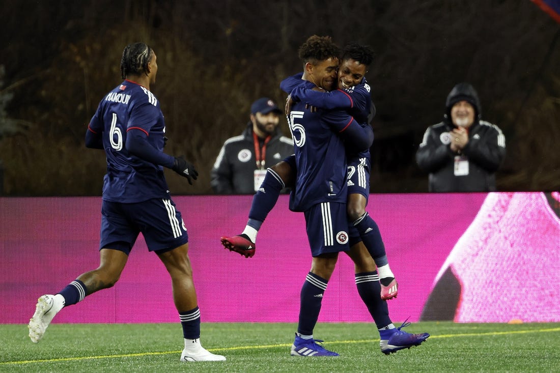 Mar 4, 2023; Foxborough, Massachusetts, USA; New England Revolution defender Brandon Bye (15) celebrates scoring a goal with forward Latif Blessing (19) in the second half against the Houston Dynamo FC at Gillette Stadium. Mandatory Credit: Winslow Townson-USA TODAY Sports