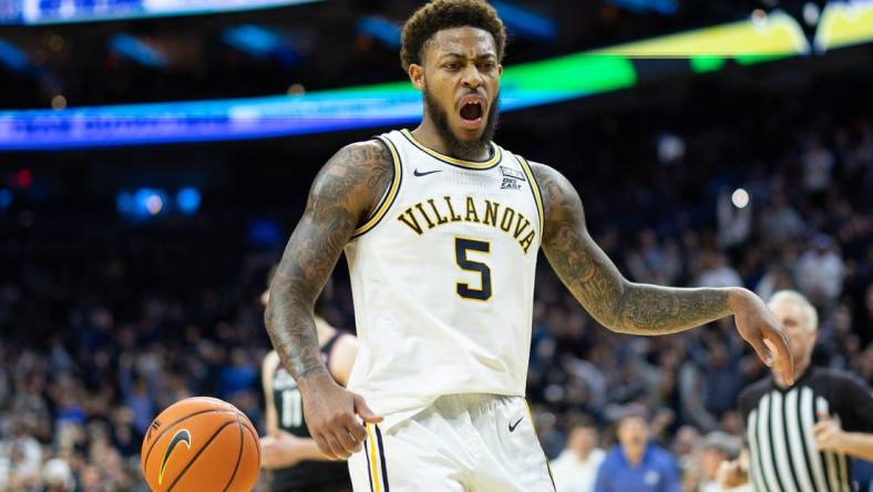 Mar 4, 2023; Philadelphia, Pennsylvania, USA; Villanova Wildcats guard Justin Moore (5) reacts after a score against the Connecticut Huskies during the second half at Wells Fargo Center. Mandatory Credit: Bill Streicher-USA TODAY Sports