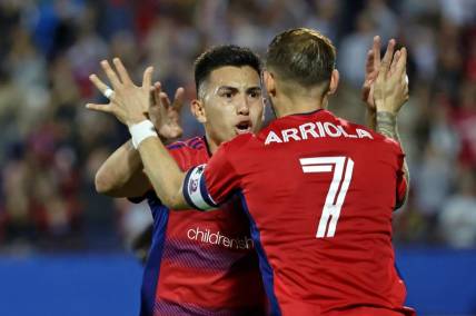 Mar 4, 2023; Frisco, Texas, USA; FC Dallas forward Alan Velasco (20) celebrates with forward Paul Arriola (7) after scoring a goal against the Los Angeles Galaxy during the first half at Toyota Stadium. Mandatory Credit: Kevin Jairaj-USA TODAY Sports