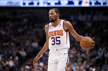 Mar 5, 2023; Dallas, Texas, USA; Phoenix Suns forward Kevin Durant (35) brings the ball up court against the Dallas Mavericks during the first quarter at the American Airlines Center. Mandatory Credit: Jerome Miron-USA TODAY Sports