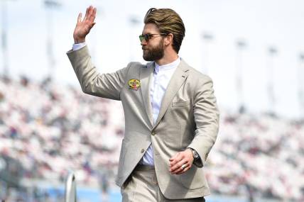 Mar 5, 2023; Las Vegas, Nevada, USA; Philadelphia Phillies right fielder Bryce Harper is introduced before the Pennzoil 400 at Las Vegas Motor Speedway. Mandatory Credit: Gary A. Vasquez-USA TODAY Sports