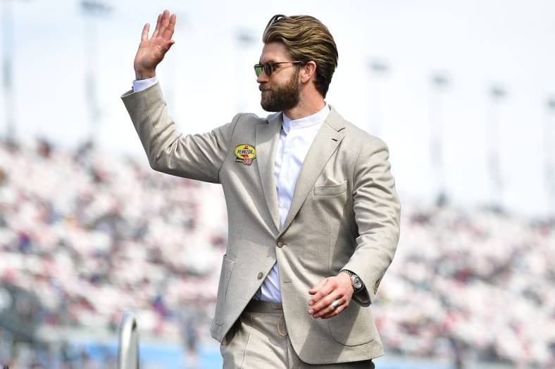 Mar 5, 2023; Las Vegas, Nevada, USA; Philadelphia Phillies right fielder Bryce Harper is introduced before the Pennzoil 400 at Las Vegas Motor Speedway. Mandatory Credit: Gary A. Vasquez-USA TODAY Sports