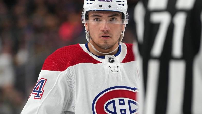 Mar 5, 2023; Las Vegas, Nevada, USA; Montreal Canadiens center Nick Suzuki (14) awaits a face off against the Vegas Golden Knights during the second period at T-Mobile Arena. Mandatory Credit: Stephen R. Sylvanie-USA TODAY Sports