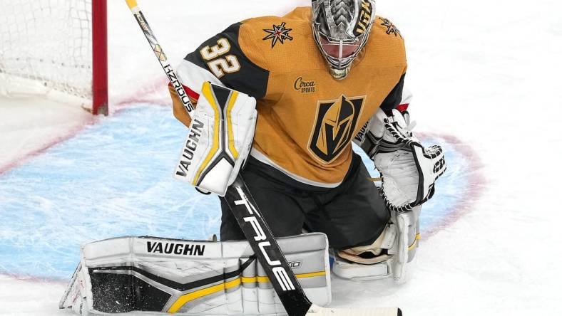 Mar 5, 2023; Las Vegas, Nevada, USA; Vegas Golden Knights goaltender Jonathan Quick (32) makes a save against the Montreal Canadiens during the third period at T-Mobile Arena. Mandatory Credit: Stephen R. Sylvanie-USA TODAY Sports