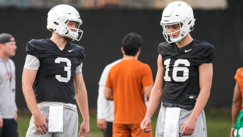 Quarterbacks Quinn Ewers (3) and Arch Manning (16) talk during the first Texas Longhorns football practice of 2023 at the Frank Denius Fields on the University of Texas at Austin campus on Monday, March 6, 2023.

Aem Texfoot First 2023 Practice 14