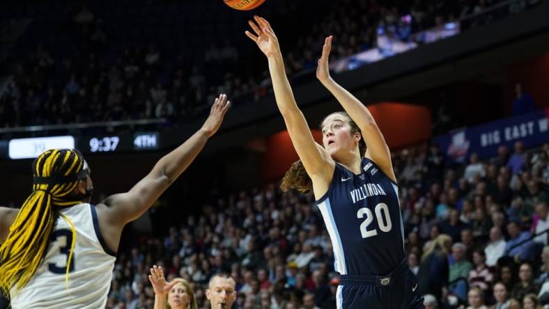 Mar 6, 2023; Uncasville, CT, USA; Villanova Wildcats forward Maddy Siegrist (20) shoots against UConn Huskies forward Aaliyah Edwards (3) in the second half at Mohegan Sun Arena. Mandatory Credit: David Butler II-USA TODAY Sports