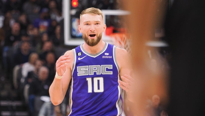 Mar 6, 2023; Sacramento, California, USA; Sacramento Kings power forward Domantas Sabonis (10) questions the no-call from the referee during the first quarter anop at Golden 1 Center. Mandatory Credit: Kelley L Cox-USA TODAY Sports