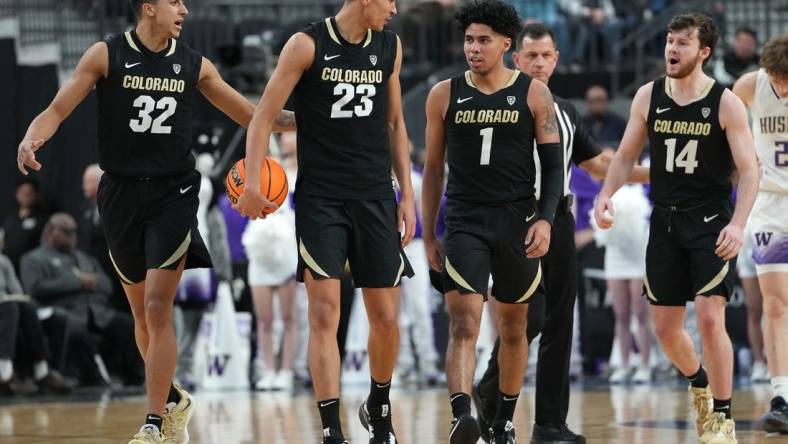 Mar 8, 2023; Las Vegas, NV, USA; Colorado Buffaloes guard Nique Clifford (32), Colorado Buffaloes forward Tristan da Silva (23), Colorado Buffaloes guard Julian Hammond III (1), and Colorado Buffaloes guard Ethan Wright (14) walk up court after a scoring play against the Washington Huskies during the second half at T-Mobile Arena. Mandatory Credit: Stephen R. Sylvanie-USA TODAY Sports