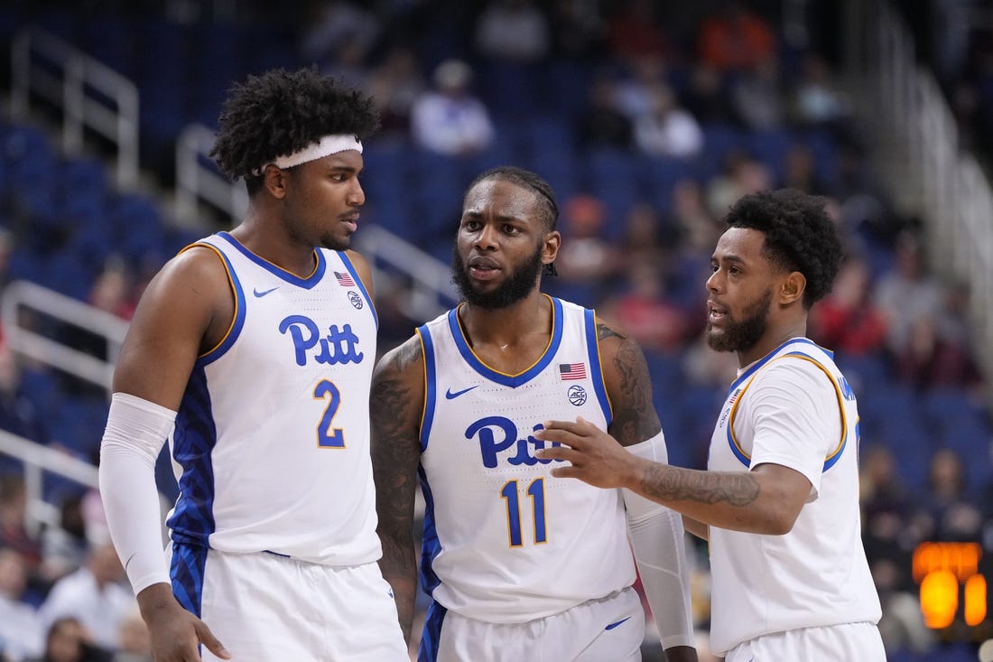 Mar 8, 2023; Greensboro, NC, USA; Pittsburgh Panthers forward Blake Hinson (2) and Pittsburgh Panthers guard Jamarius Burton (11) and Pittsburgh Panthers guard Nelly Cummings (0) huddle in the second half of the second round at Greensboro Coliseum. Mandatory Credit: Bob Donnan-USA TODAY Sports