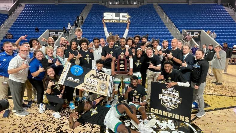 Texas A&M-Corpus Christi men's basketball players and coaches celebrate after winning the Southland Conference Tournament championship on Wednesday, March 8, 2023 in Lake Charles, La.

Img 1426