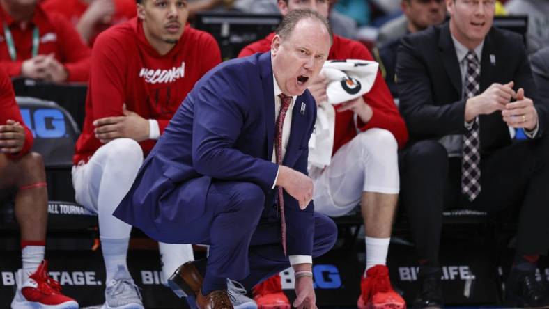 Mar 8, 2023; Chicago, IL, USA; Wisconsin Badgers head coach Greg Gard yells to his team during the second half of a game against the Ohio State Buckeyes at United Center. Mandatory Credit: Kamil Krzaczynski-USA TODAY Sports