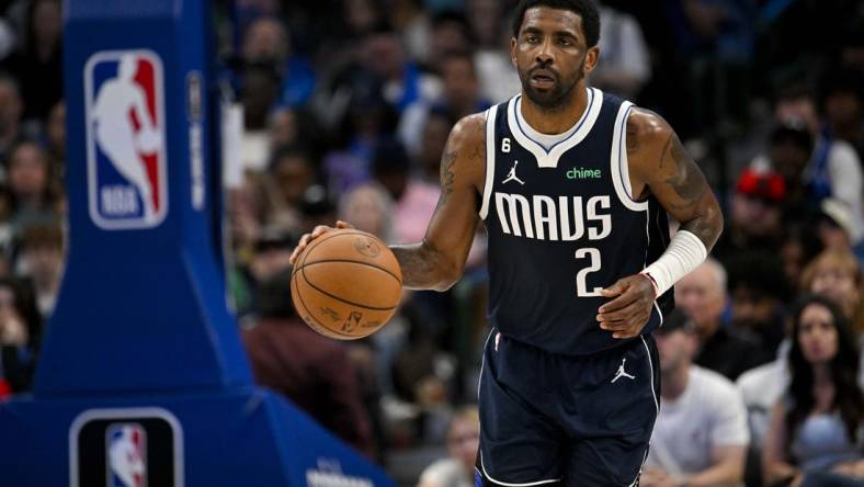 Mar 5, 2023; Dallas, Texas, USA; Dallas Mavericks guard Kyrie Irving (2) in action during the game between the Dallas Mavericks and the Phoenix Suns at the American Airlines Center. Mandatory Credit: Jerome Miron-USA TODAY Sports