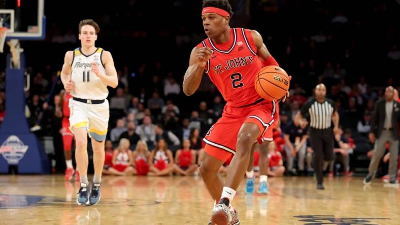 Mar 9, 2023; New York, NY, USA; St. John's Red Storm guard AJ Storr (2) brings the ball up court against the Marquette Golden Eagles during the first half at Madison Square Garden. Mandatory Credit: Brad Penner-USA TODAY Sports