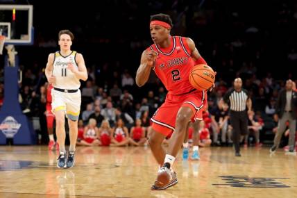 Mar 9, 2023; New York, NY, USA; St. John's Red Storm guard AJ Storr (2) brings the ball up court against the Marquette Golden Eagles during the first half at Madison Square Garden. Mandatory Credit: Brad Penner-USA TODAY Sports