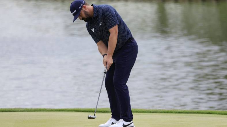 Chad Ramey putts on hole 18 during the first round of The Players golf tournament Thursday, March 9, 2023 at TPC Sawgrass in Ponte Vedra Beach, Fla. [Corey Perrine/Florida Times-Union]

Ramey