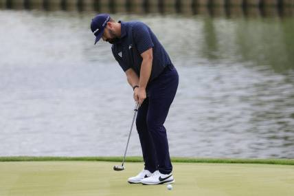 Chad Ramey putts on hole 18 during the first round of The Players golf tournament Thursday, March 9, 2023 at TPC Sawgrass in Ponte Vedra Beach, Fla. [Corey Perrine/Florida Times-Union]

Ramey