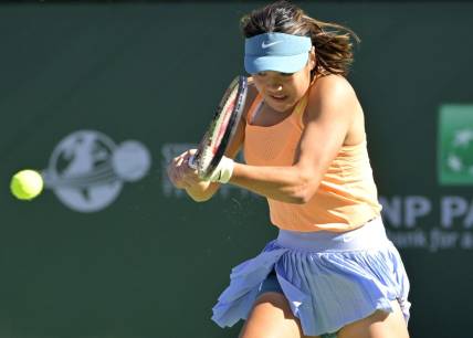 Mar 9, 2023; Indian Wells, CA, USA;  Emma Raducanu (GBR) hits a shot in her first round match against Danka Kovinic (not pictured) on day 4 of the BNP Paribas Open at the Indian Wells Tennis Garden. Mandatory Credit: Jayne Kamin-Oncea-USA TODAY Sports