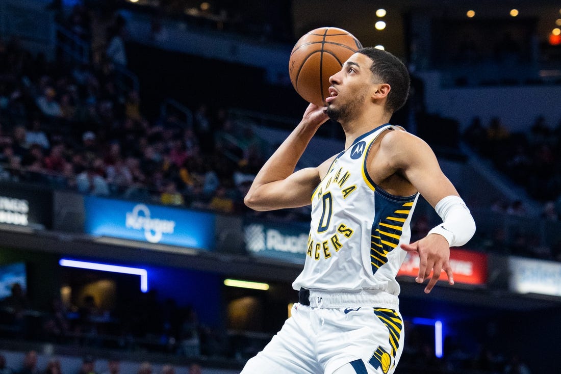 Mar 9, 2023; Indianapolis, Indiana, USA; Indiana Pacers guard Tyrese Haliburton (0) shoots the ball in the first quarter against the Houston Rockets at Gainbridge Fieldhouse. Mandatory Credit: Trevor Ruszkowski-USA TODAY Sports