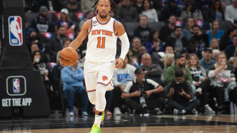 Mar 9, 2023; Sacramento, California, USA; New York Knicks guard Jalen Brunson (11) brings the ball up the court during the first quarter of the game against the Sacramento Kings at Golden 1 Center. Mandatory Credit: Ed Szczepanski-USA TODAY Sports