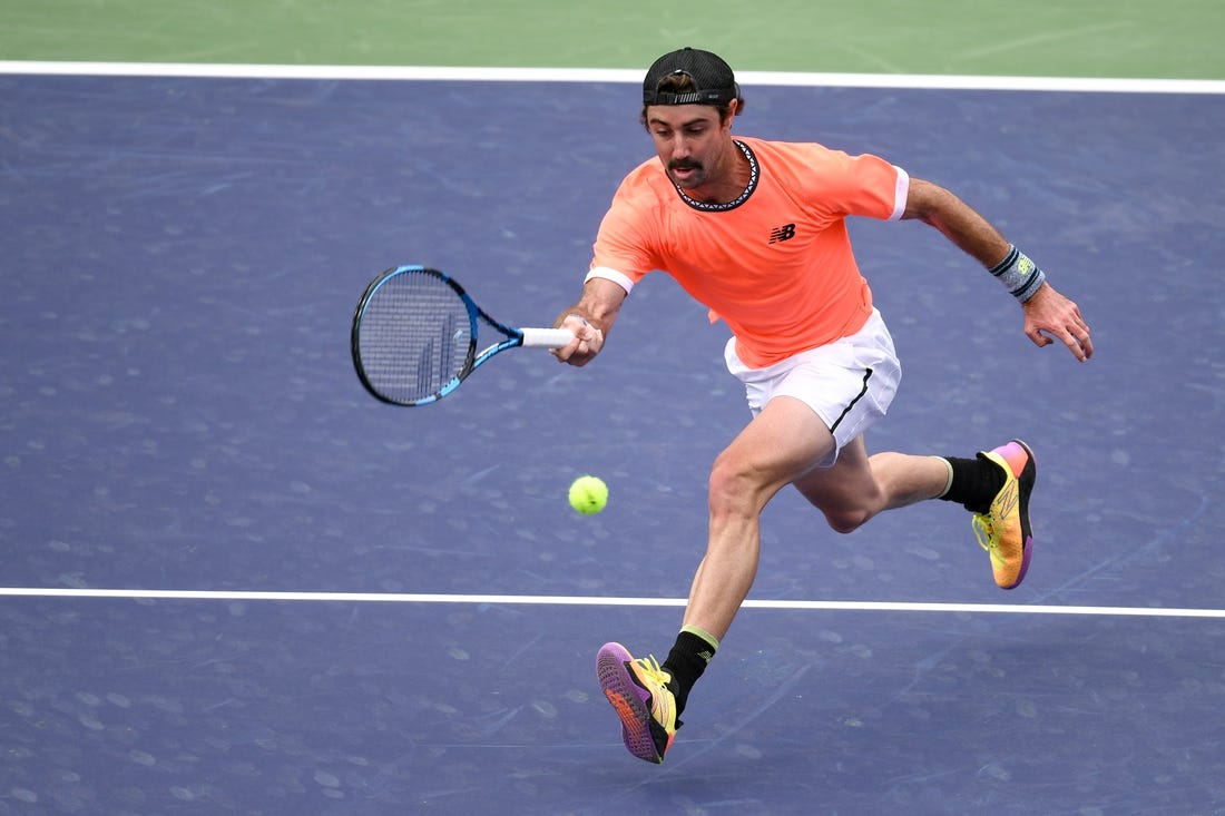 Mar 10, 2023; Indian Wells, CA, USA; Jordan Thompson (AUS) hits a forehand approach shot during his 2nd round match against Stefanos Tsitsipas (GRE) (not pictured) during the BNP Paribas Open at Indian Wells Tennis Garden. Mandatory Credit: Jonathan Hui-USA TODAY Sports