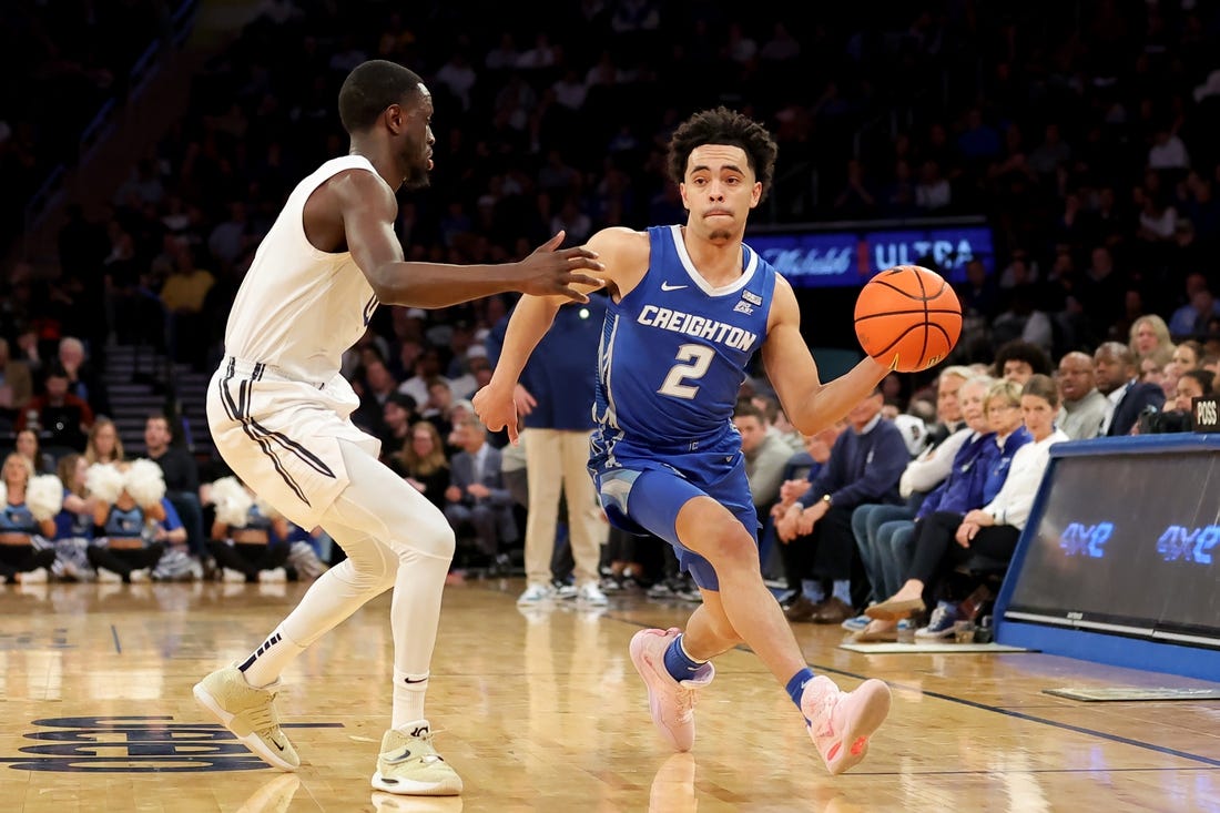 Mar 10, 2023; New York, NY, USA; Creighton Bluejays guard Ryan Nembhard (2) looks to pass the ball against Xavier Musketeers guard Souley Boum (0) during the first half at Madison Square Garden. Mandatory Credit: Brad Penner-USA TODAY Sports