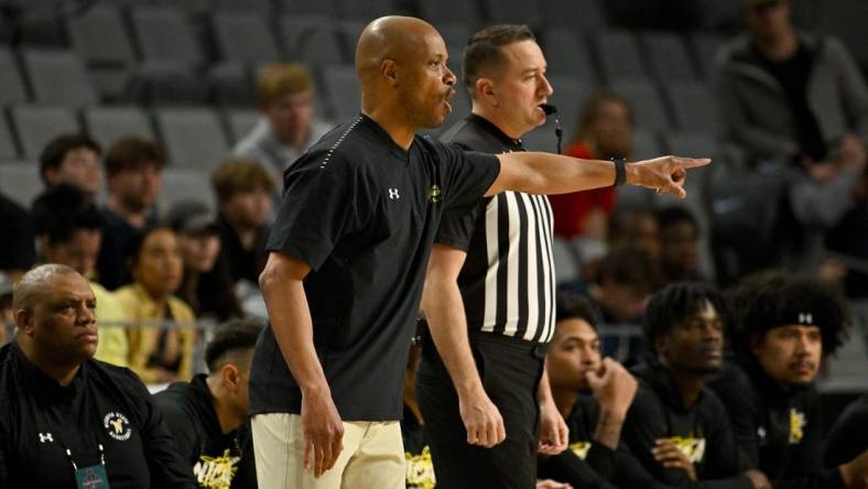 Mar 10, 2023; Fort Worth, TX, USA; Wichita State Shockers head coach Isaac Brown motions to his team during the first half against the Tulane Green Wave at Dickies Arena. Mandatory Credit: Jerome Miron-USA TODAY Sports