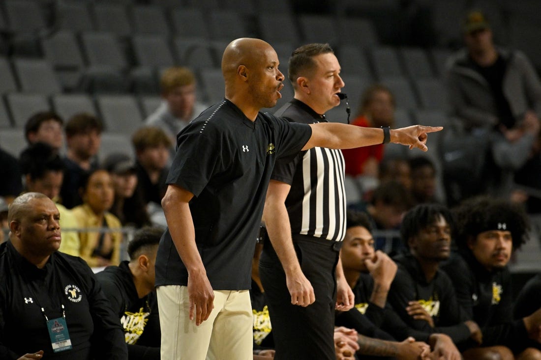 Mar 10, 2023; Fort Worth, TX, USA; Wichita State Shockers head coach Isaac Brown motions to his team during the first half against the Tulane Green Wave at Dickies Arena. Mandatory Credit: Jerome Miron-USA TODAY Sports