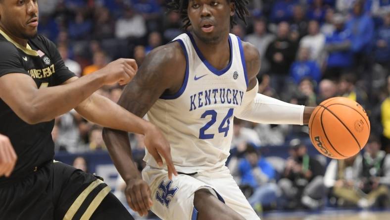 Mar 10, 2023; Nashville, TN, USA; Kentucky Wildcats forward Chris Livingston (24) dribbles against the Vanderbilt Commodores during the second half at Bridgestone Arena. Mandatory Credit: Steve Roberts-USA TODAY Sports