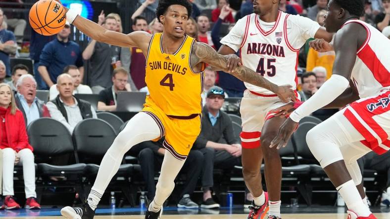 Mar 10, 2023; Las Vegas, NV, USA; Arizona State Sun Devils guard Desmond Cambridge Jr. (4) dribbles against Arizona Wildcats guard Cedric Henderson Jr. (45) during the first half at T-Mobile Arena. Mandatory Credit: Stephen R. Sylvanie-USA TODAY Sports