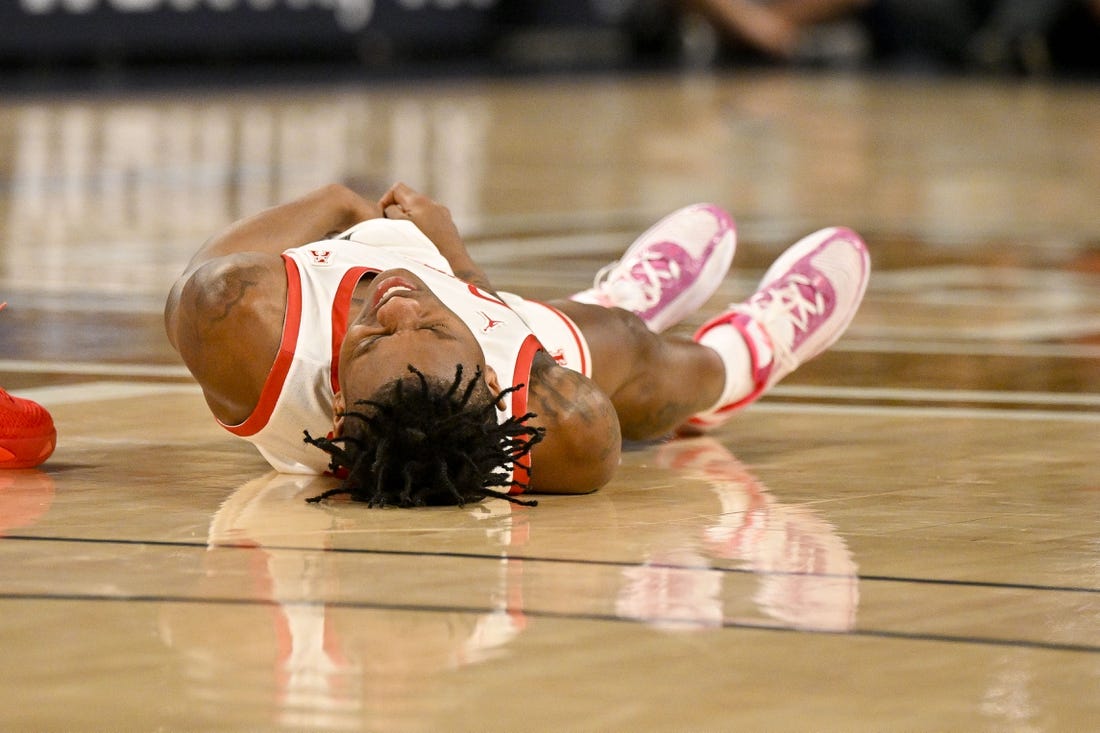 Mar 11, 2023; Fort Worth, TX, USA; Houston Cougars guard Marcus Sasser (0) is injured during the first half against the Cincinnati Bearcats at Dickies Arena. Mandatory Credit: Jerome Miron-USA TODAY Sports