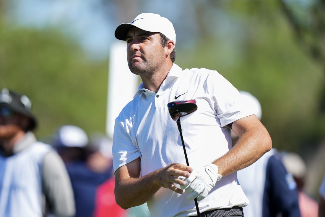 Mar 11, 2023; Ponte Vedra Beach, Florida, USA; Scottie Scheffler watches his tee shot during the third round of THE PLAYERS Championship golf tournament. Mandatory Credit: David Yeazell-USA TODAY Sports