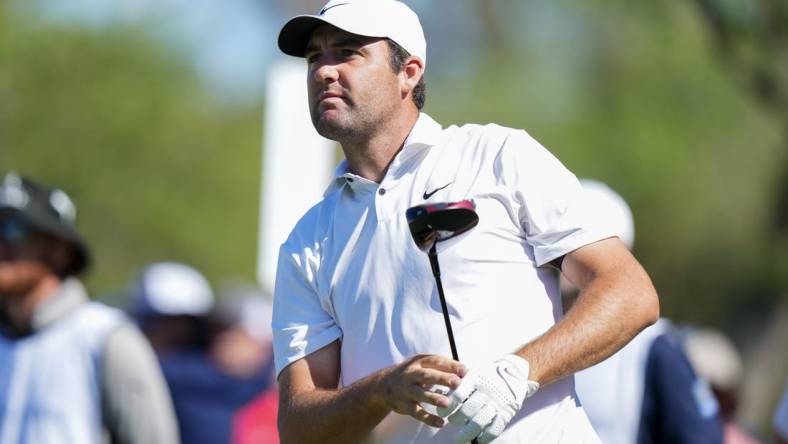 Mar 11, 2023; Ponte Vedra Beach, Florida, USA; Scottie Scheffler watches his tee shot during the third round of THE PLAYERS Championship golf tournament. Mandatory Credit: David Yeazell-USA TODAY Sports