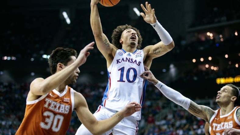 Mar 11, 2023; Kansas City, MO, USA; Kansas Jayhawks forward Jalen Wilson (10) puts up a shot during the first half against the Texas Longhorns at T-Mobile Center. Mandatory Credit: William Purnell-USA TODAY Sports