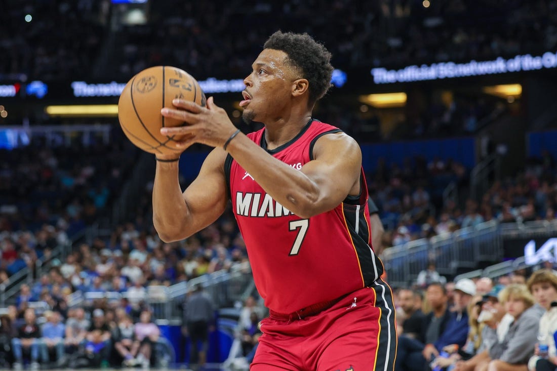 Mar 11, 2023; Orlando, Florida, USA; Miami Heat guard Kyle Lowry (7) shoots the ball against the Orlando Magic during the first quarter at Amway Center. Mandatory Credit: Mike Watters-USA TODAY Sports