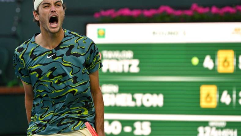 Mar 11, 2023; Indian Wells, CA, USA;  Taylor Fritz (USA) celebrates after defeating Ben Shelton (USA) in their second round match in the BNP Paribas Open at the Indian Wells Tennis Garden. Mandatory Credit: Jayne Kamin-Oncea-USA TODAY Sports