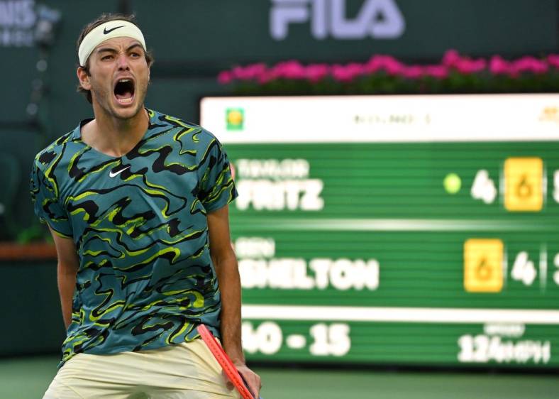 Mar 11, 2023; Indian Wells, CA, USA;  Taylor Fritz (USA) celebrates after defeating Ben Shelton (USA) in their second round match in the BNP Paribas Open at the Indian Wells Tennis Garden. Mandatory Credit: Jayne Kamin-Oncea-USA TODAY Sports