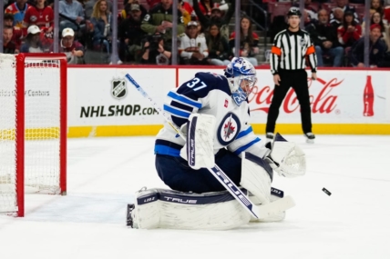 Mar 11, 2023; Sunrise, Florida, USA; Winnipeg Jets goaltender Connor Hellebuyck (37) makes a save against the Florida Panthers during the second period at FLA Live Arena. Mandatory Credit: Rich Storry-USA TODAY Sports