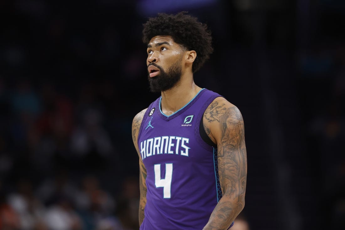 Mar 11, 2023; Charlotte, North Carolina, USA; Charlotte Hornets center Nick Richards (4) looks up at the scoreboard during the first half against the Utah Jazz at Spectrum Center. Mandatory Credit: Brian Westerholt-USA TODAY Sports