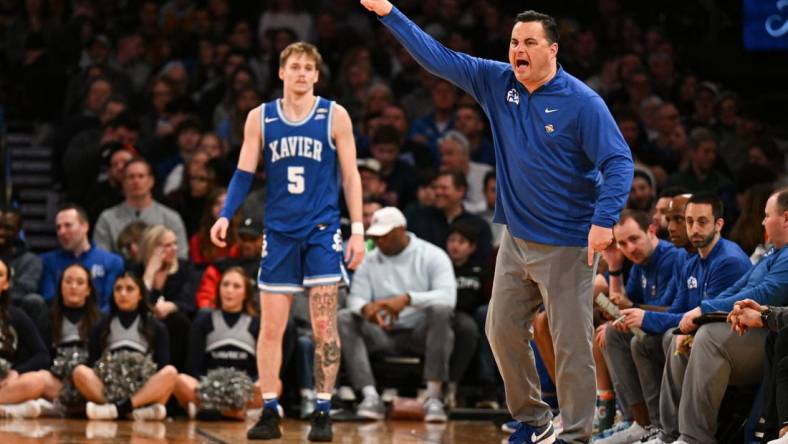 Mar 11, 2023; New York, NY, USA; Xavier Musketeers head coach Sean Miller yells instructions to players while Xavier Musketeers guard Adam Kunkel (5) looks on during the second half at Madison Square Garden. Mandatory Credit: Mark Smith-USA TODAY Sports