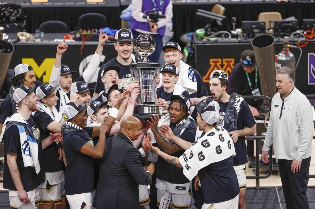 Mar 12, 2023; Chicago, IL, USA; Purdue Boilermakers players celebrate after winning Big Ten Conference Tournament Championship against the Penn State Nittany Lions at United Center. Mandatory Credit: Kamil Krzaczynski-USA TODAY Sports