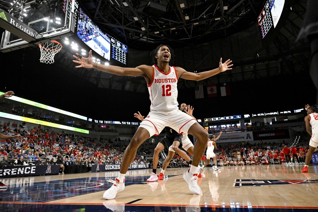 Mar 12, 2023; Fort Worth, TX, USA; Houston Cougars guard Tramon Mark (12) defends against the Memphis Tigers in bound pass during the second half at Dickies Arena. Mandatory Credit: Jerome Miron-USA TODAY Sports