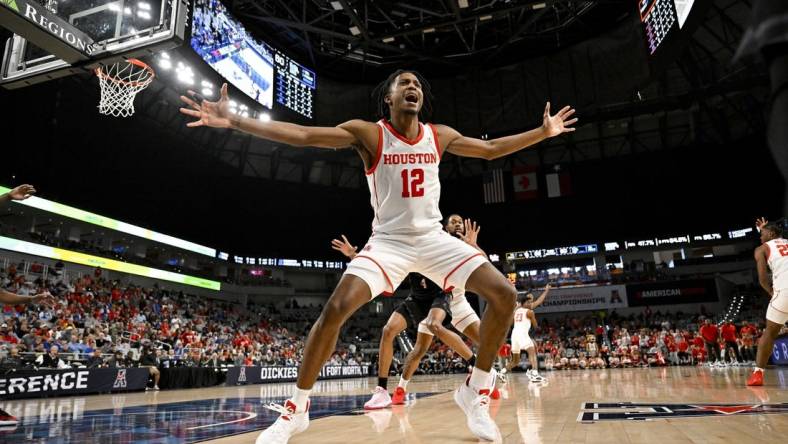 Mar 12, 2023; Fort Worth, TX, USA; Houston Cougars guard Tramon Mark (12) defends against the Memphis Tigers in bound pass during the second half at Dickies Arena. Mandatory Credit: Jerome Miron-USA TODAY Sports